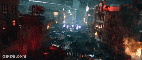 An Aerial View Of A Destroyed City With A Sign That Says ' Nn ' On Top Of A Building GIF