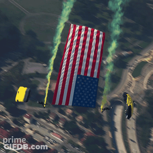 An Aerial View Of A Parachute With An American Flag On It GIF