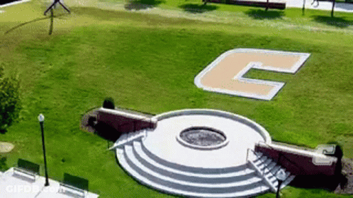An Aerial View Of A Park With A Large Letter C In The Middle GIF