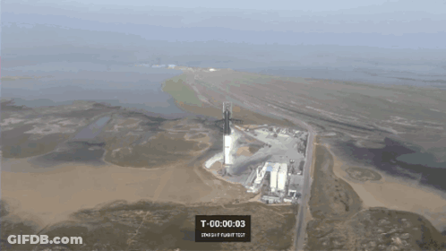 An Aerial View Of A Rocket Being Launched With T 00 00 01 Displayed On The Screen GIF