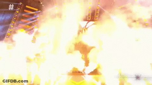 An Aerial View Of A Stadium With A Lot Of Fire And Smoke Coming Out Of It . GIF