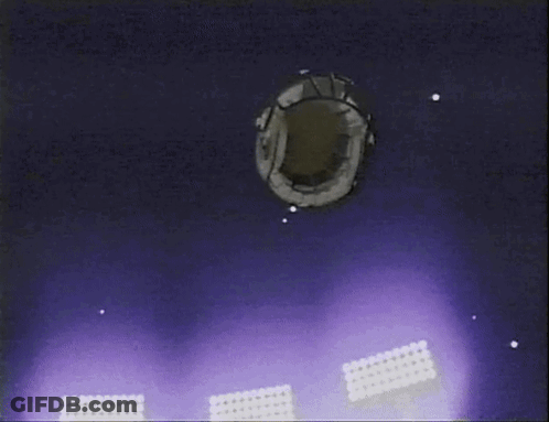 An Aerial View Of A Stadium With Purple Lights Coming Out Of It GIF