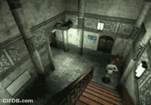 An Aerial View Of A Staircase In A Building With A Sign On The Wall That Says ' Elevator ' GIF
