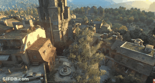 An Aerial View Of A Town With A Fountain In The Middle Of It GIF