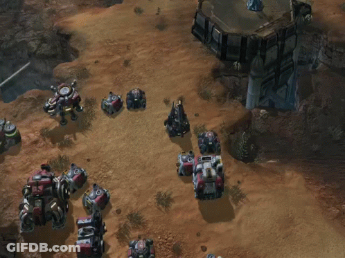 An Aerial View Of A Video Game Where A Robot Is Being Destroyed By A Group Of Smaller Robots GIF