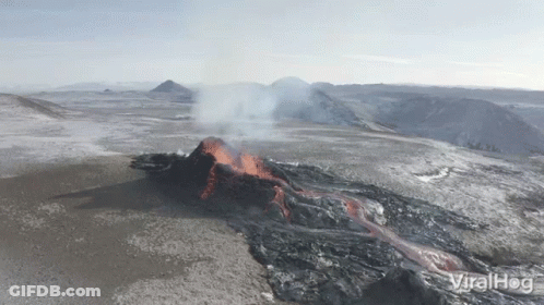 An Aerial View Of A Volcano That Says Viralhog GIF