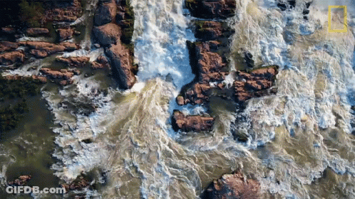 An Aerial View Of A Waterfall With The National Geographic Logo Visible GIF
