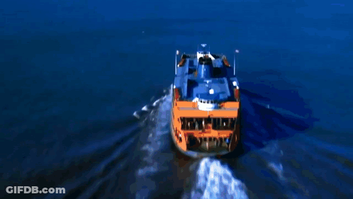 An Aerial View Of The New York City Skyline With The Twin Towers In The Distance GIF