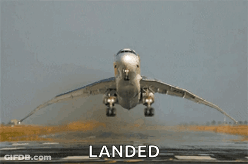An Airplane Is Taking Off From A Runway And The Word Landed Is On The Bottom GIF
