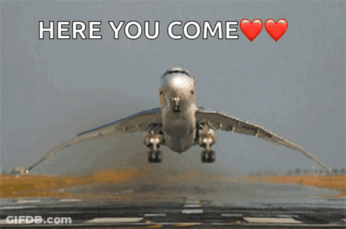 An Airplane Is Taking Off From A Runway And The Words Here You Come Are Above It GIF
