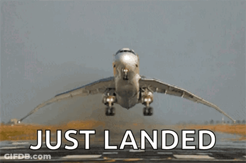An Airplane Is Taking Off From A Runway And The Words Just Landed Are Below It GIF