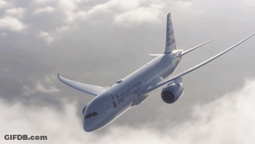 An American Airlines Plane Is Flying Through The Air GIF