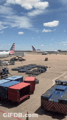 An American Airlines Plane Sits On The Tarmac GIF