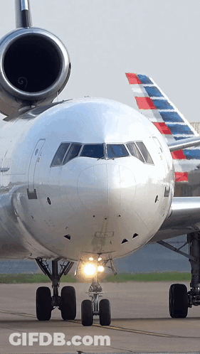 An American Airlines Plane Sits On The Tarmac GIF
