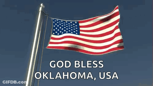 An American Flag Waving In The Wind With The Words God Bless Oklahoma Usa GIF
