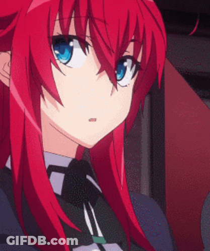 An Anime Girl With Red Hair And Blue Eyes GIF