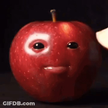 An Apple With A Face Painted On It 'S Face GIF