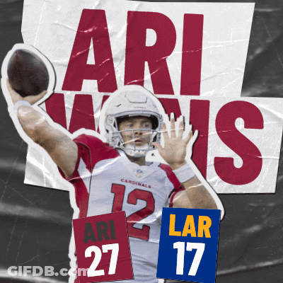 An Arizona Cardinals Player Throws A Football In Front Of A Sign That Says Ari Wins GIF