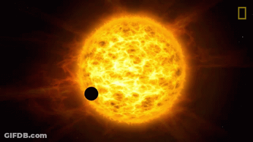 An Artist 'S Impression Of A Sun With A Black Planet In The Middle GIF