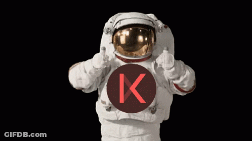 An Astronaut Giving A Thumbs Up With A Circle With The Letter K In It GIF