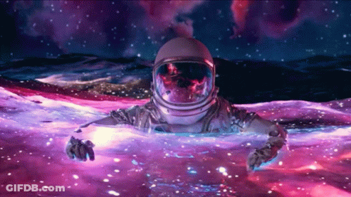 An Astronaut In A Space Suit Is Floating In A Purple Space GIF