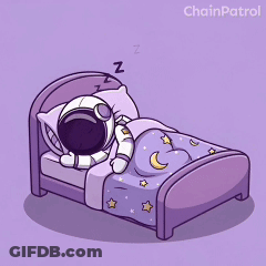 An Astronaut Is Sleeping In A Bed With A Purple Blanket GIF