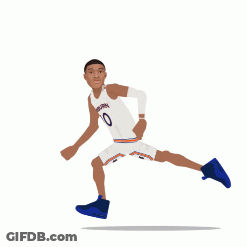 An Auburn Basketball Player Is Holding A Basketball GIF