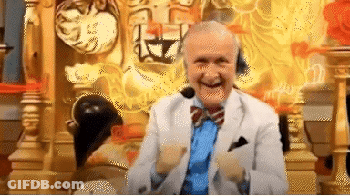 An Elderly Man In A Suit And Tie Is Sitting On A Throne With A Microphone On His Head . GIF