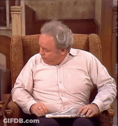 Elderly Man Reading Newspaper GIF