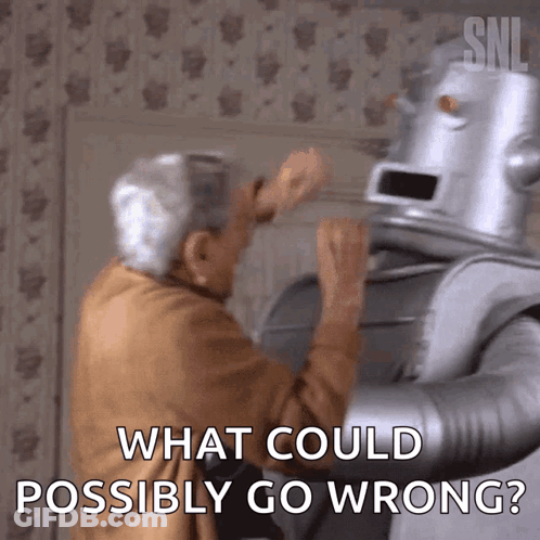 An Elderly Man Is Standing Next To A Robot That Says What Could Possibly Go Wrong GIF