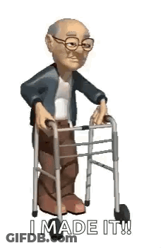 An Elderly Man Is Using A Walker To Walk . GIF