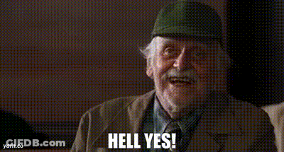 An Elderly Man Wearing A Hat And A Suit Is Smiling And Saying `` Hell Yes '' . GIF