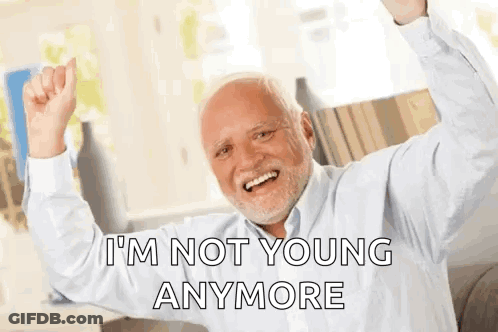 An Elderly Man With A Beard Is Making A Funny Face And Saying `` I 'M Not Young Anymore '' . GIF