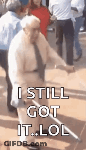 An Elderly Man With A Cane Is Dancing In Front Of A Crowd And Says I Still Got It Lol . GIF