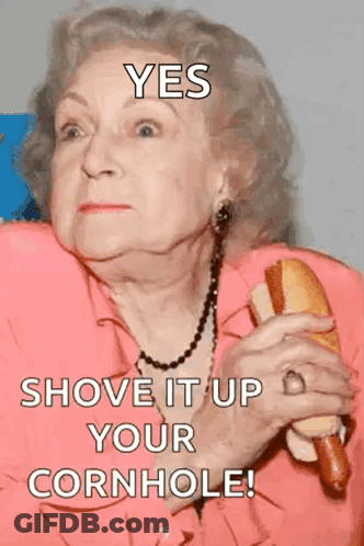 An Elderly Woman Holding A Hot Dog With A Caption That Says Yes Shove It Up Your Cornhole GIF