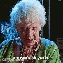 An Elderly Woman In A Green Shirt Says It 'S Been 84 Years ... GIF