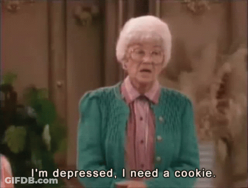 An Elderly Woman In A Green Sweater Says I 'M Depressed I Need A Cookie GIF