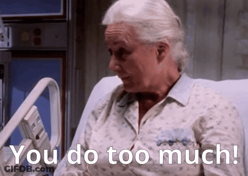 An Elderly Woman In A Hospital Bed With The Words You Do Too Much GIF