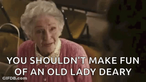An Elderly Woman In A Pink Sweater Is Saying `` You Shouldn 'T Make Fun Of An Old Lady Dear '' . GIF