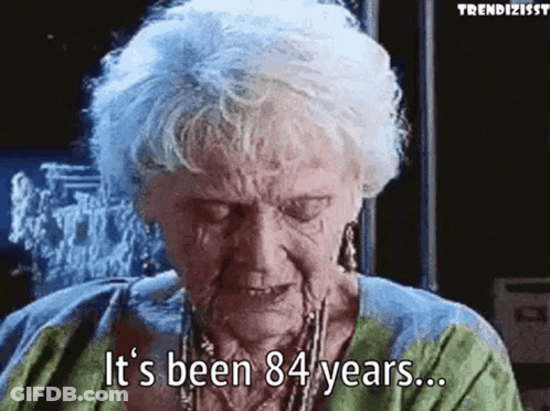An Elderly Woman Is Crying And Saying It 'S Been 84 Years GIF