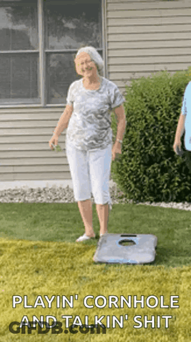 An Elderly Woman Is Playing Cornhole And Talking Shit GIF