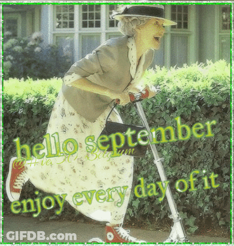 An Elderly Woman Is Riding A Scooter With The Words Hello September Enjoy Every Day Of It Below Her GIF