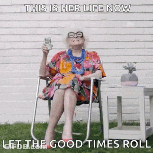 An Elderly Woman Is Sitting In A Chair Holding A Glass Of Wine And A Dollar Bill . GIF