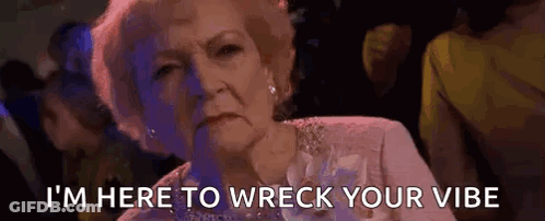 An Elderly Woman Is Sitting In A Crowded Room And Says `` I 'M Here To Wreck Your Vibe '' GIF