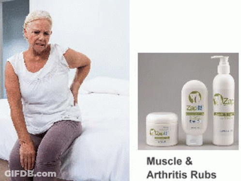 An Elderly Woman Is Sitting On A Bed With Her Back In Pain And A Picture Of Muscle And Arthritis Rubs GIF