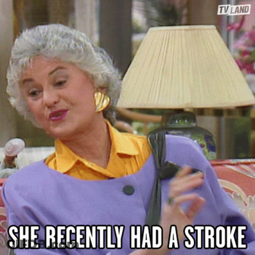 An Elderly Woman Is Sitting On A Couch With A Lamp And A Caption That Says She Recently Had A Stroke . GIF
