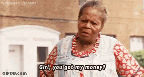 An Elderly Woman Is Standing In Front Of A Building And Talking To Someone . GIF