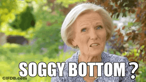 An Elderly Woman Says Soggy Bottom In Front Of A Tree GIF