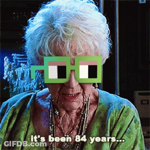 An Elderly Woman Wearing A Pair Of Glasses That Say It 'S Been 84 Years GIF