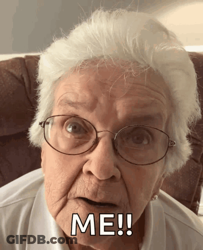 An Elderly Woman Wearing Glasses Says Me ! GIF